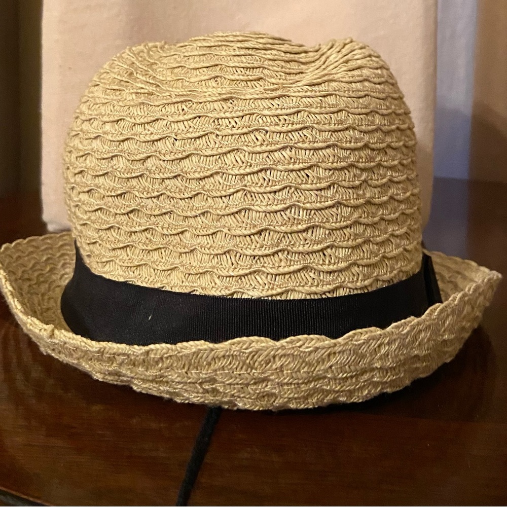 Sand color fedora hat.